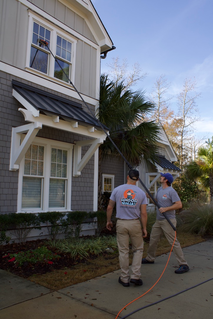 A Window Ninjas professionals providing expert Columbia outdoor window washing services.